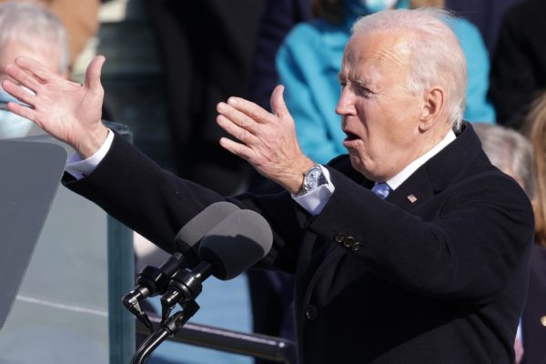 Joe Biden giving a speech during his 2021 presidential inauguration with a Rolex on his wrist.