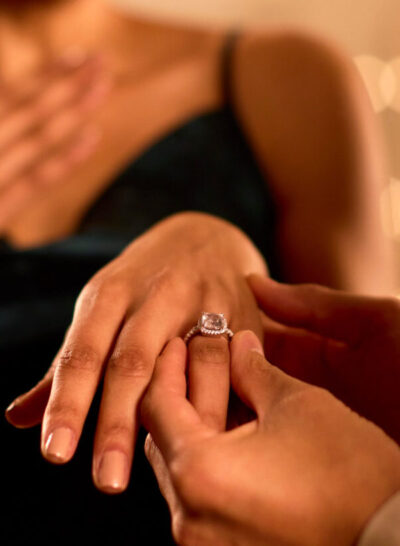 Close Up Of Loving Couple Celebrating Engagement At Party Together